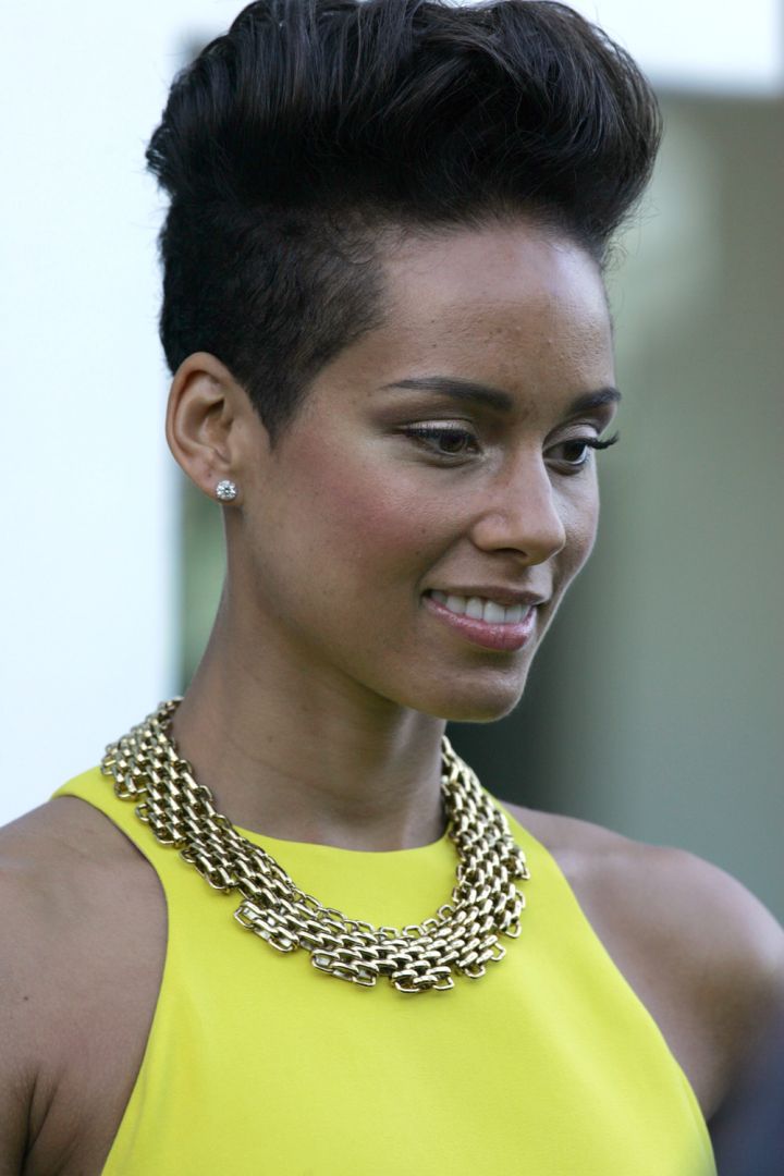 Alicia Keys co-founds Keep a Child Alive to support HIV-affected children and families in 2003